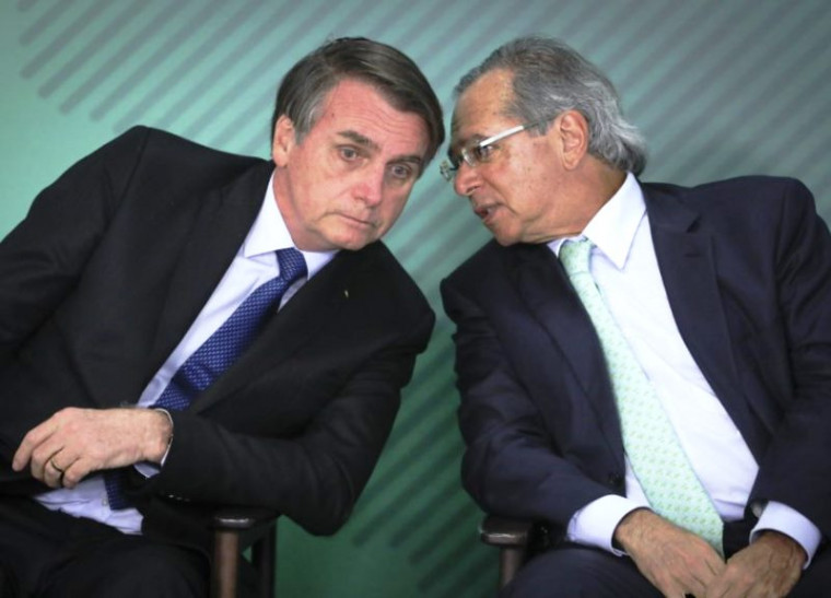 Bolsonaro (esq.) e Paulo Guedes