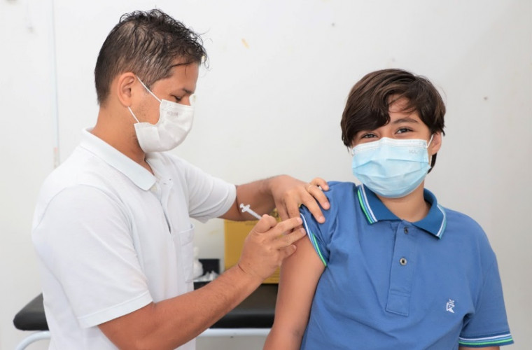 Paciente sendo vacinado